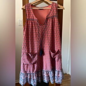 Pink patterned dress.